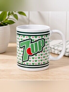 Vintage 2007 7UP ceramic coffee mug featuring a fun all-over green and red heart